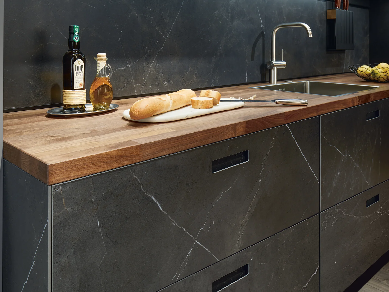 wooden worktop and marmor like kitchen front