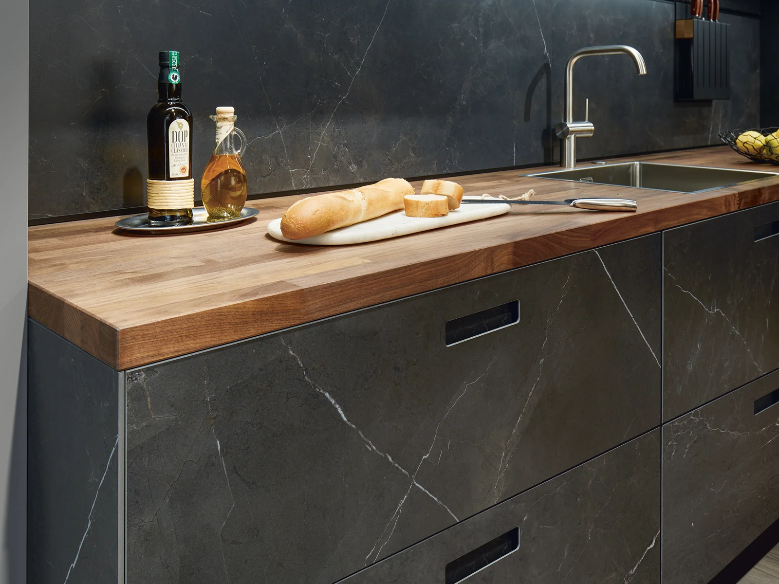 wooden worktop and marmor like kitchen front