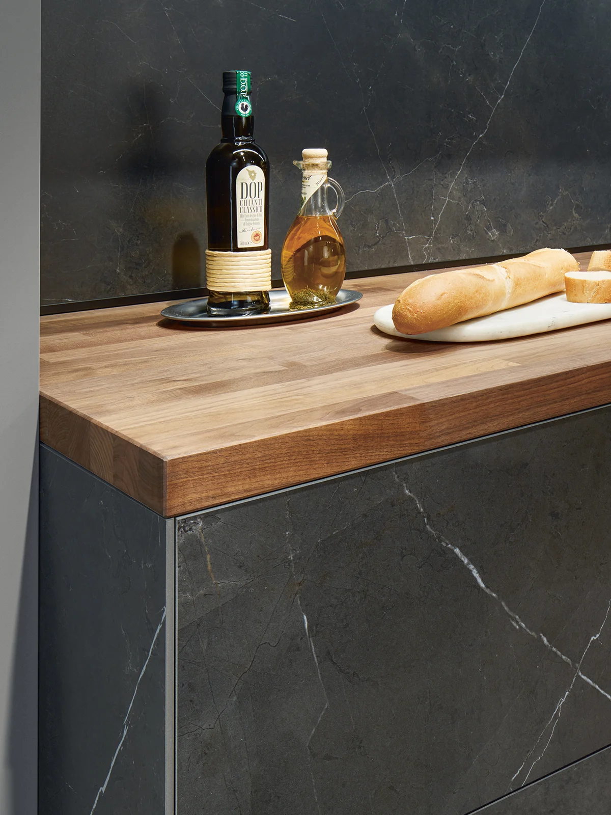 wooden worktop and marmor like kitchen front