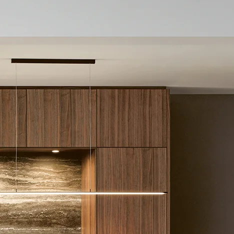 open plan kitchen in natural walnut with shelves