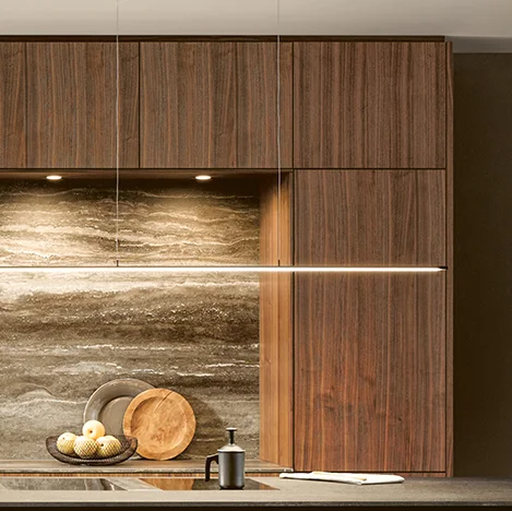 open plan kitchen in natural walnut with shelves