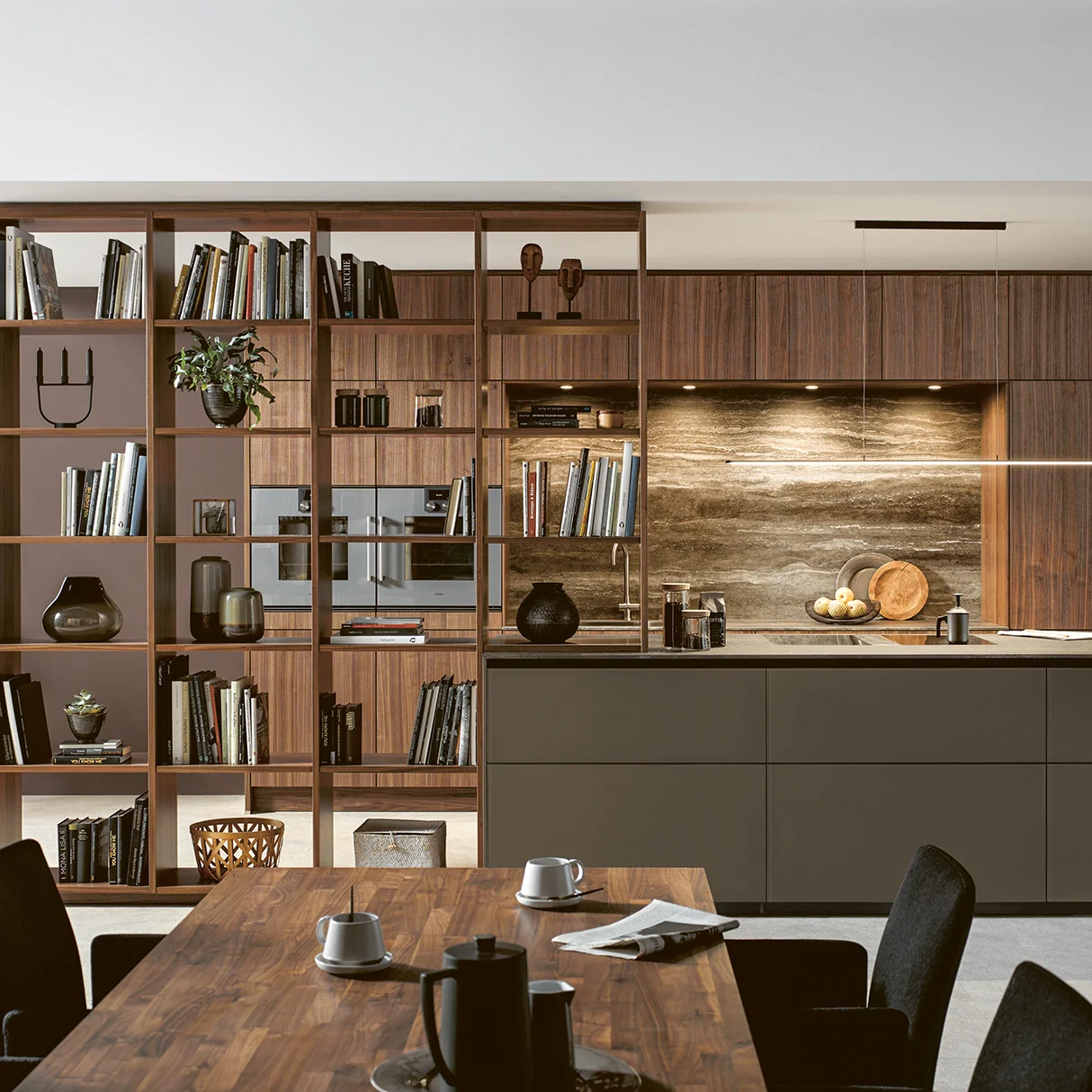 open plan kitchen in natural walnut with lighting