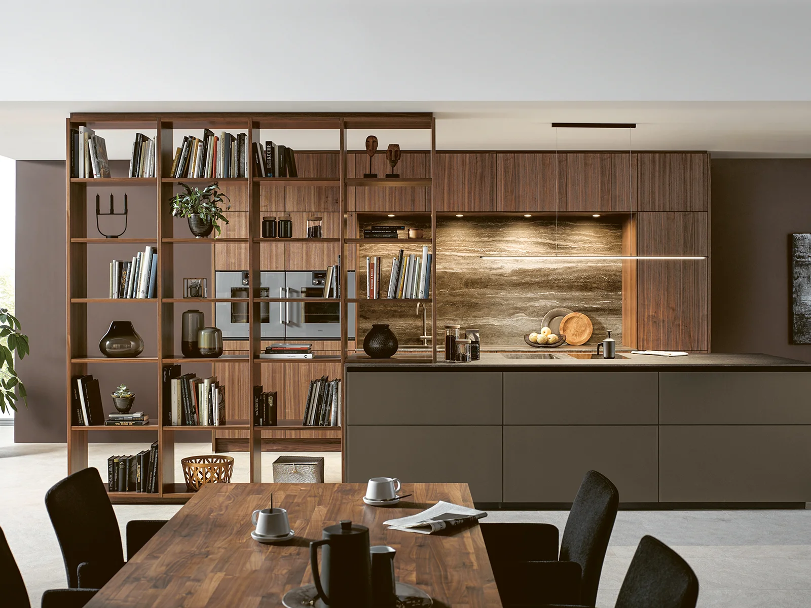 open plan kitchen in natural walnut with lighting