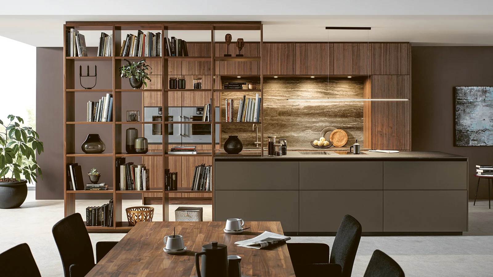 open plan kitchen in natural walnut with lighting
