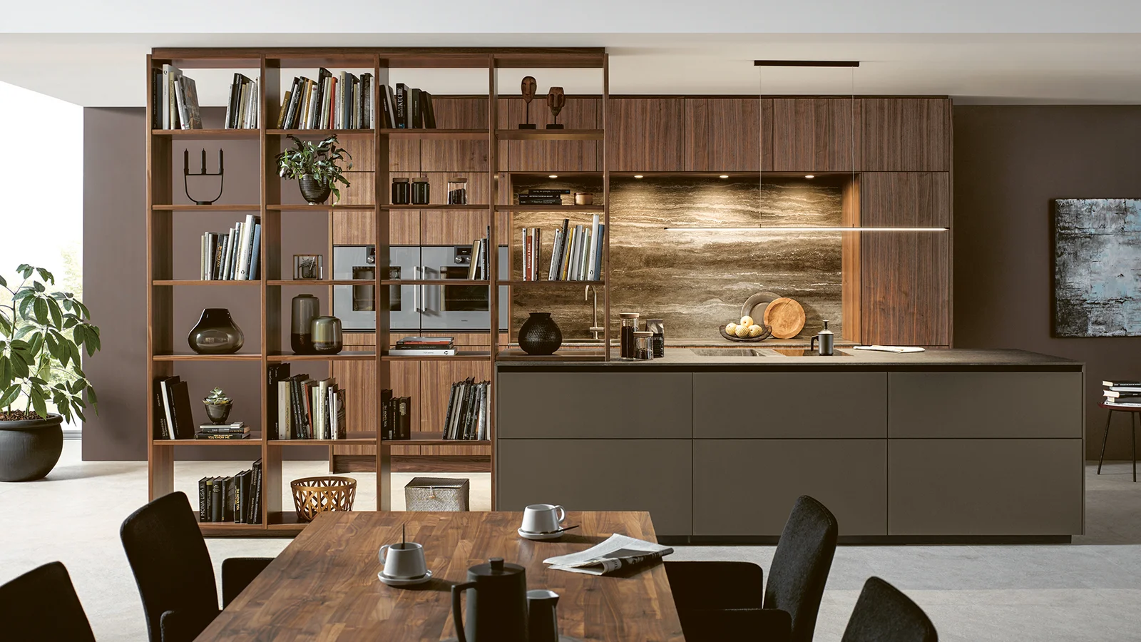 open plan kitchen in natural walnut with lighting