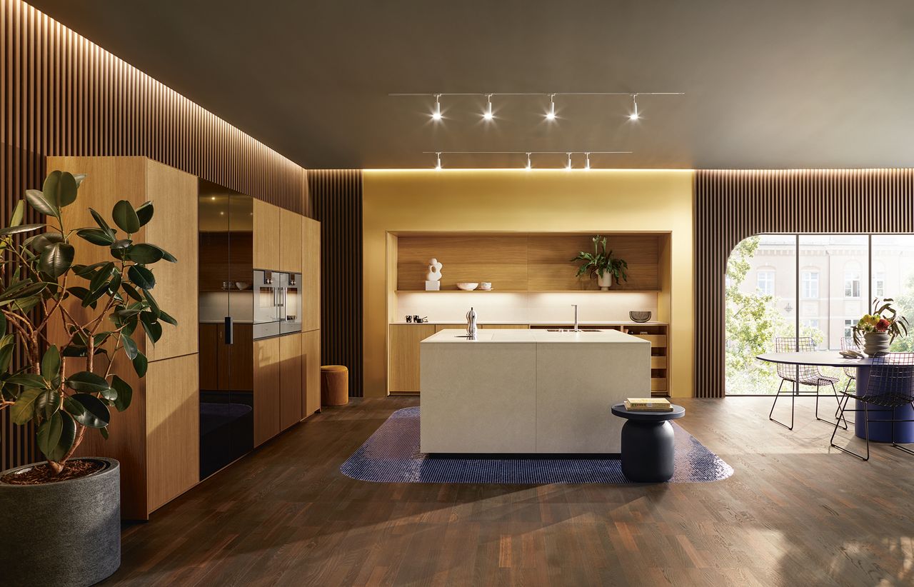 a kitchen with wooden front